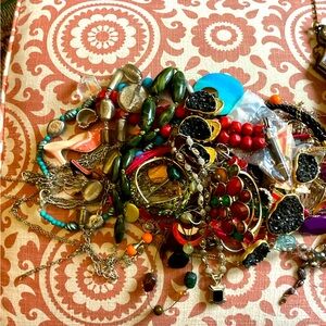 Large bag of costume jewelry.  Necklaces. Rings assortment. Bag included